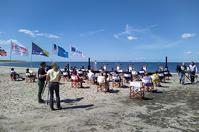 Covid Proof Hybride persconferentie op het strand huur verhuur